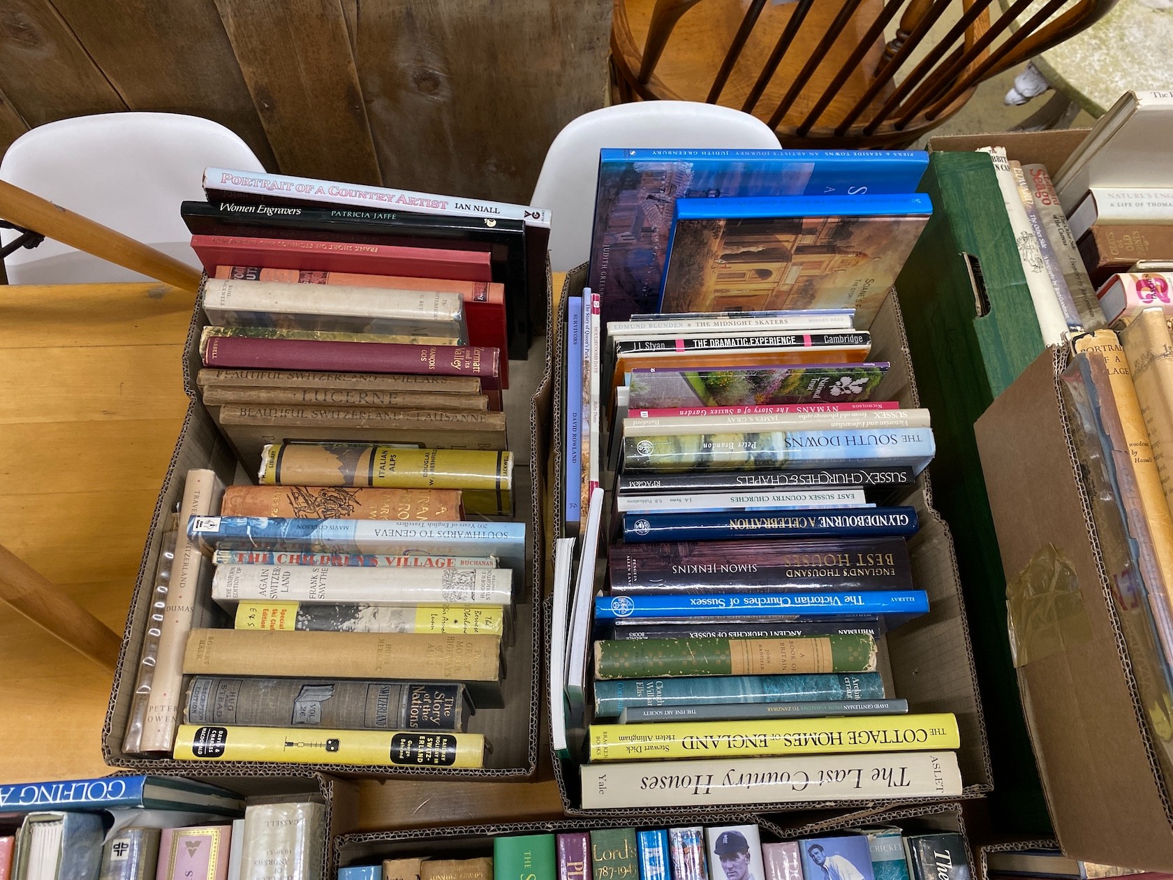 Seven boxes of assorted books, sporting history, English architecture and fine art related